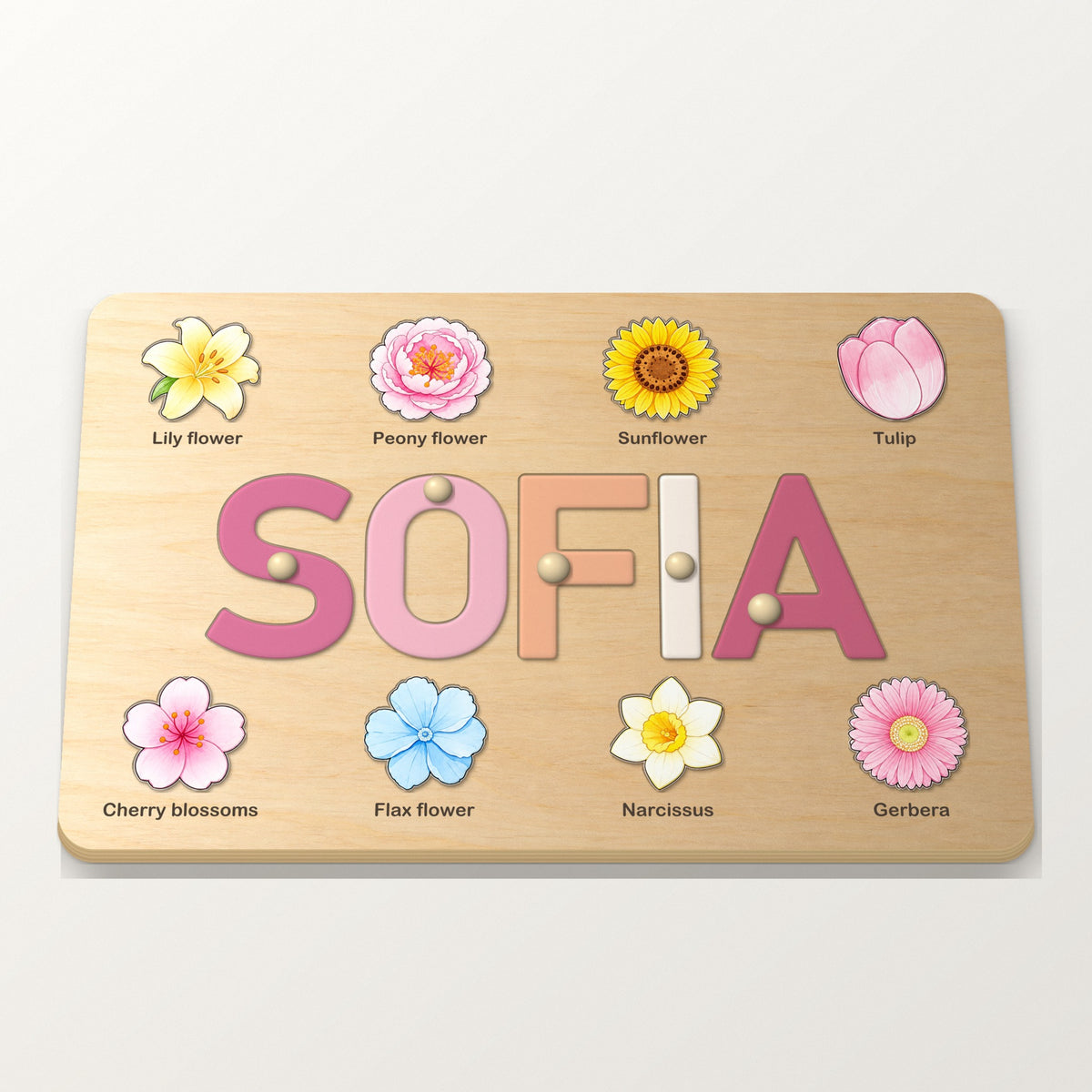 Rosa navnepuslespill med blomster og navnet SOFIA